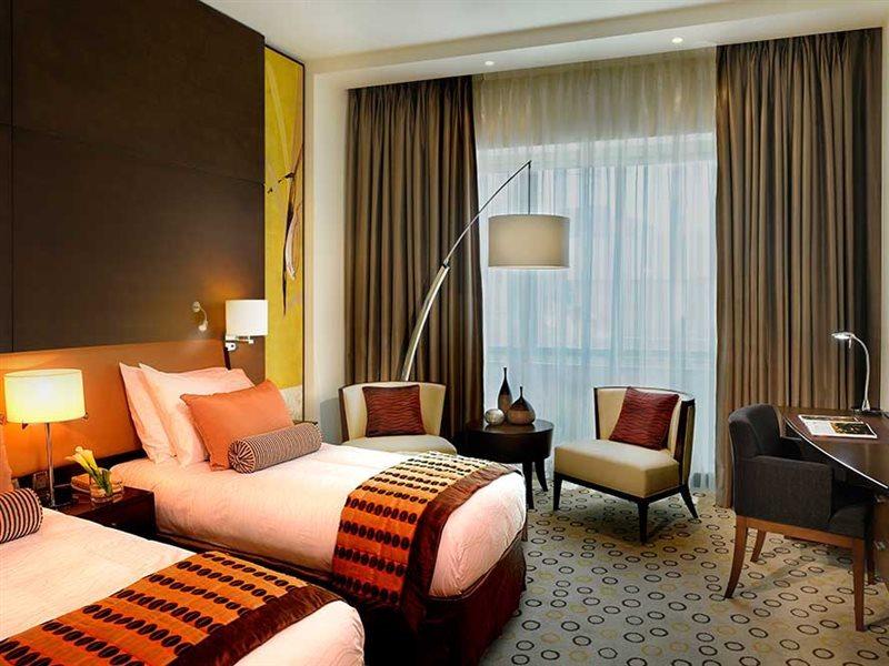 Asiana Hotel Dubai Exterior foto A room at the hotel