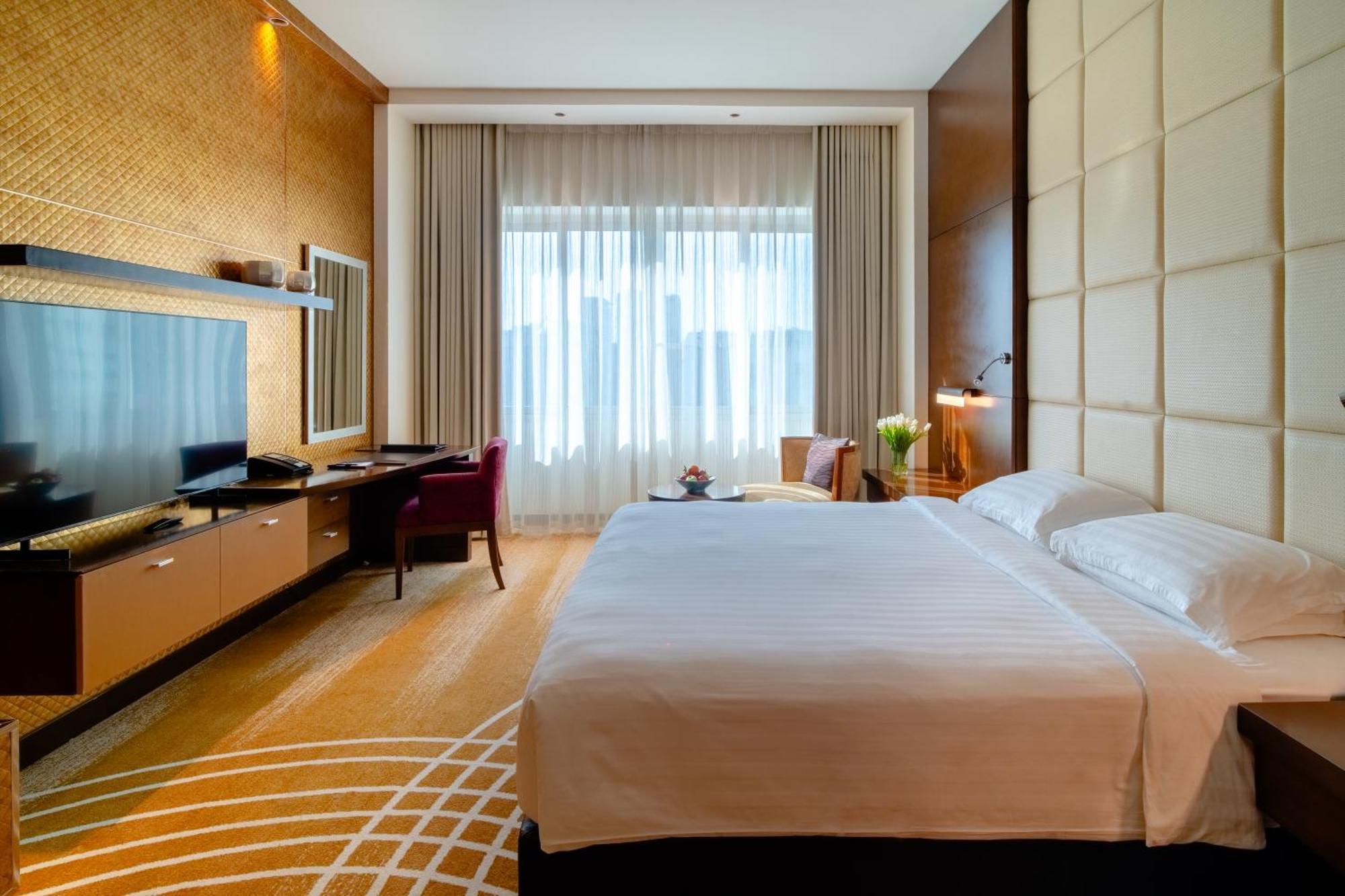 Asiana Hotel Dubai Exterior foto A room at the hotel