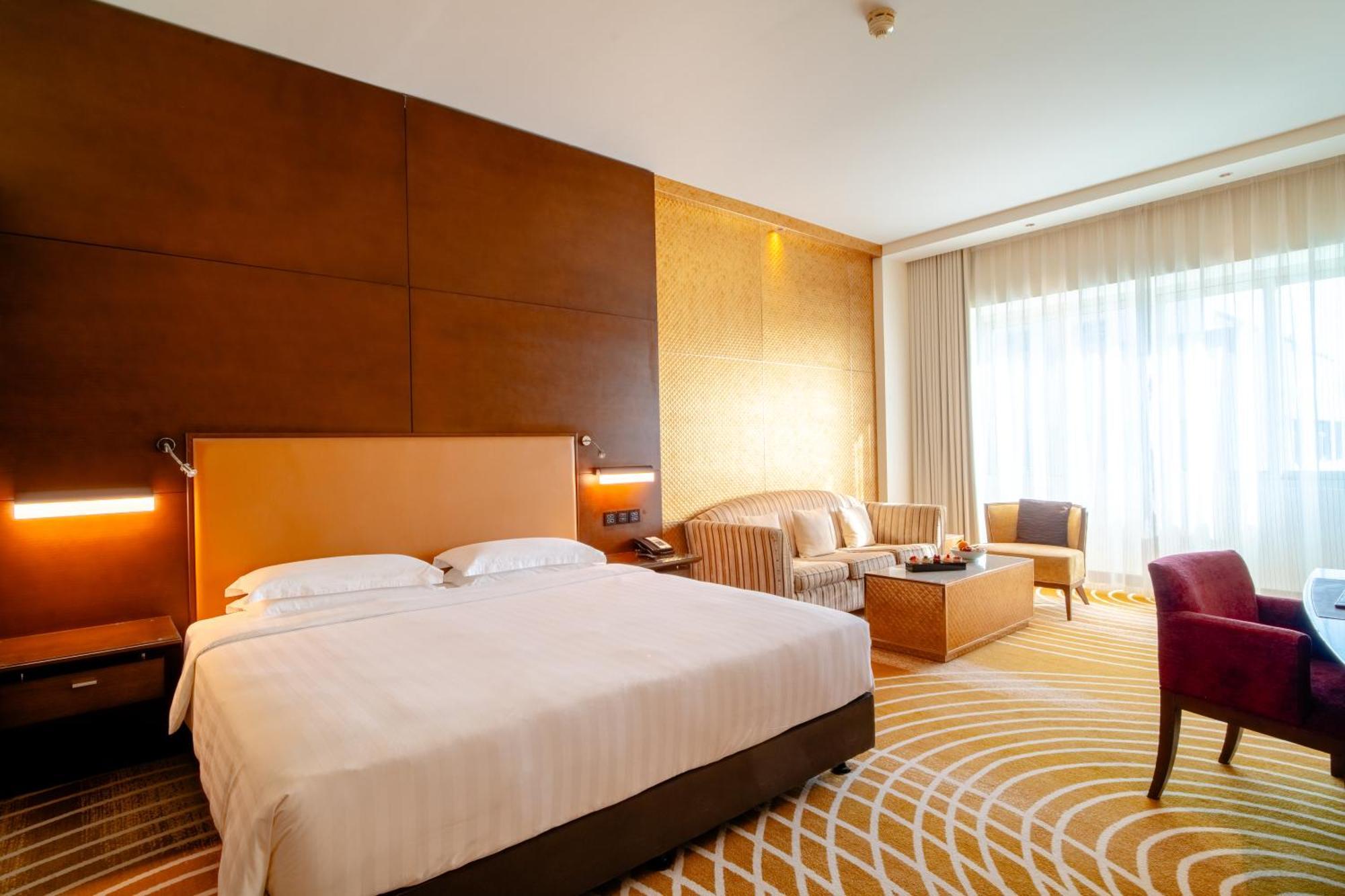 Asiana Hotel Dubai Exterior foto A room at the hotel