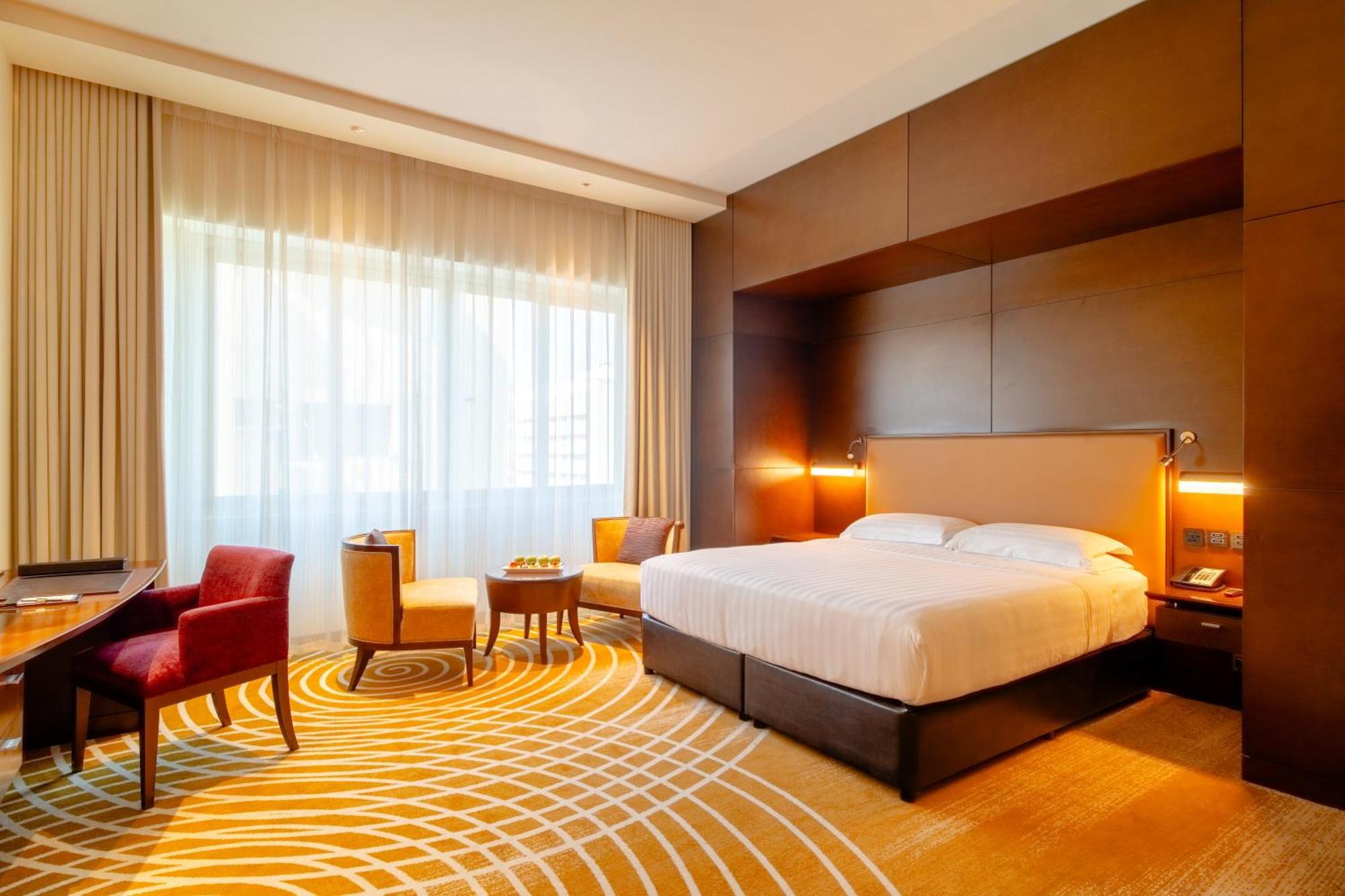 Asiana Hotel Dubai Exterior foto A room at the hotel