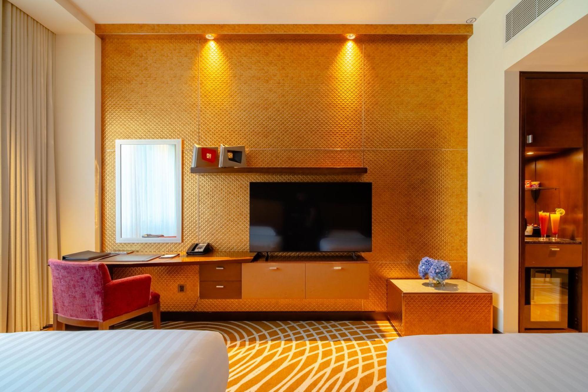 Asiana Hotel Dubai Exterior foto A room at the hotel